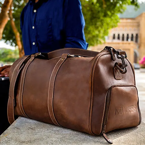 Vintage Leather Duffle Bag With Adjustable Shoulder Strap